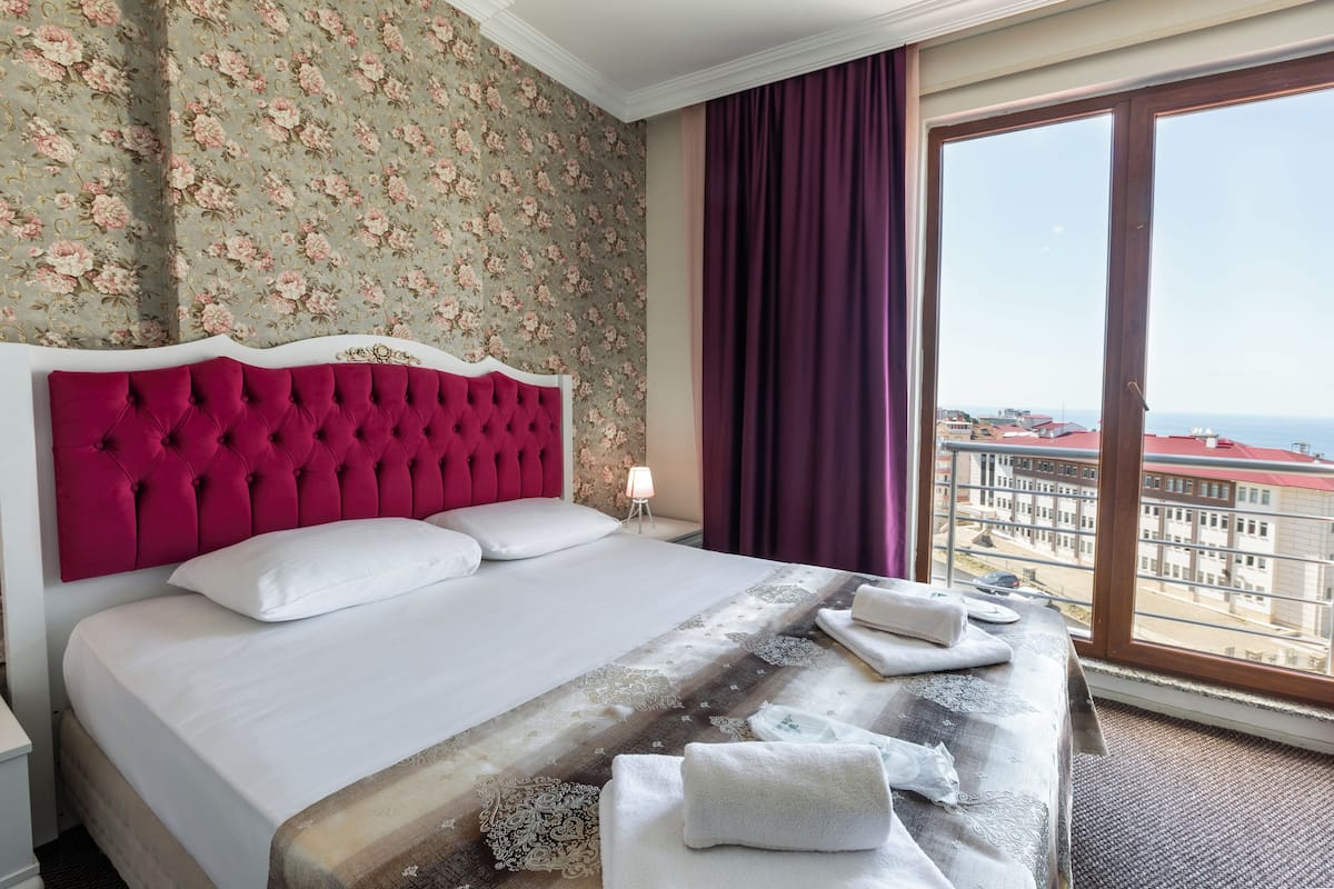 Deluxe Apartment, Balcony, Sea View | Desk, iron/ironing board (on request), WiFi (free)