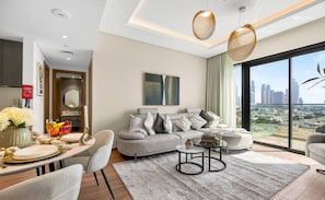 TV - Sunset Burj Views| Premium 1BR in City Walk Hub (Dubai)