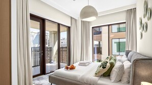 Desk, iron/ironing board, WiFi, bed sheets - Beachside 3BR with Pool Views & Lagoon Access (Dubai)