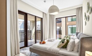 Desk, iron/ironing board, WiFi, bed sheets - Beachside 3BR with Pool Views & Lagoon Access (Dubai)