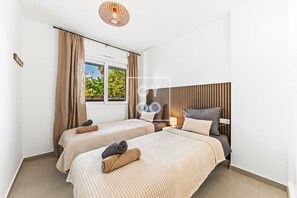 Iron/ironing board, WiFi, bed sheets - Pilar Sunplace Deluxe, ground-floor resort apt, pool, garden view, by OYOOSTAYS (Pilar de la Horadada)