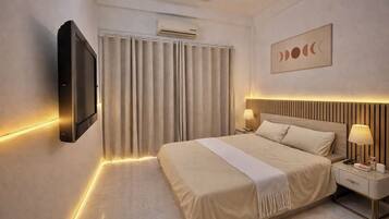 Tabla de planchar con plancha, wifi y ropa de cama