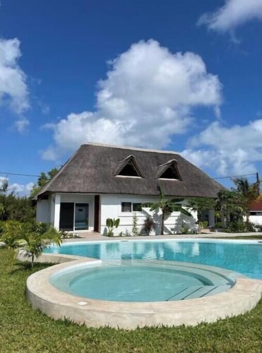 Botanica Suites Apt. 8 | Poolfront Apartment with Private Garden & Terrace