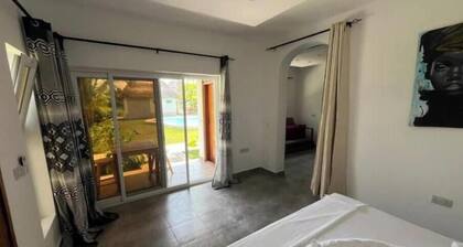Botanica Suites Apt. 8 | Poolfront Apartment with Private Garden & Terrace