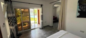 Botanica Suites Apt. 8 | Poolfront Apartment with Private Garden & Terrace