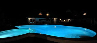 Botanica Suites Apt. 7 | Poolfront Apartment with Private Garden & Terrace