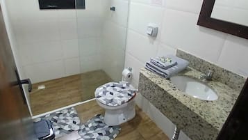 Shower, towels, soap, toilet paper
