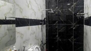 Shower, free toiletries, hair dryer, slippers