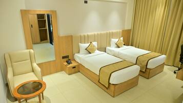 Desk, laptop workspace, free WiFi, bed sheets