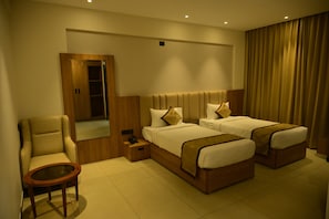 Desk, laptop workspace, free WiFi, bed sheets - BHAVANIS Vista by Icon (Hosur)