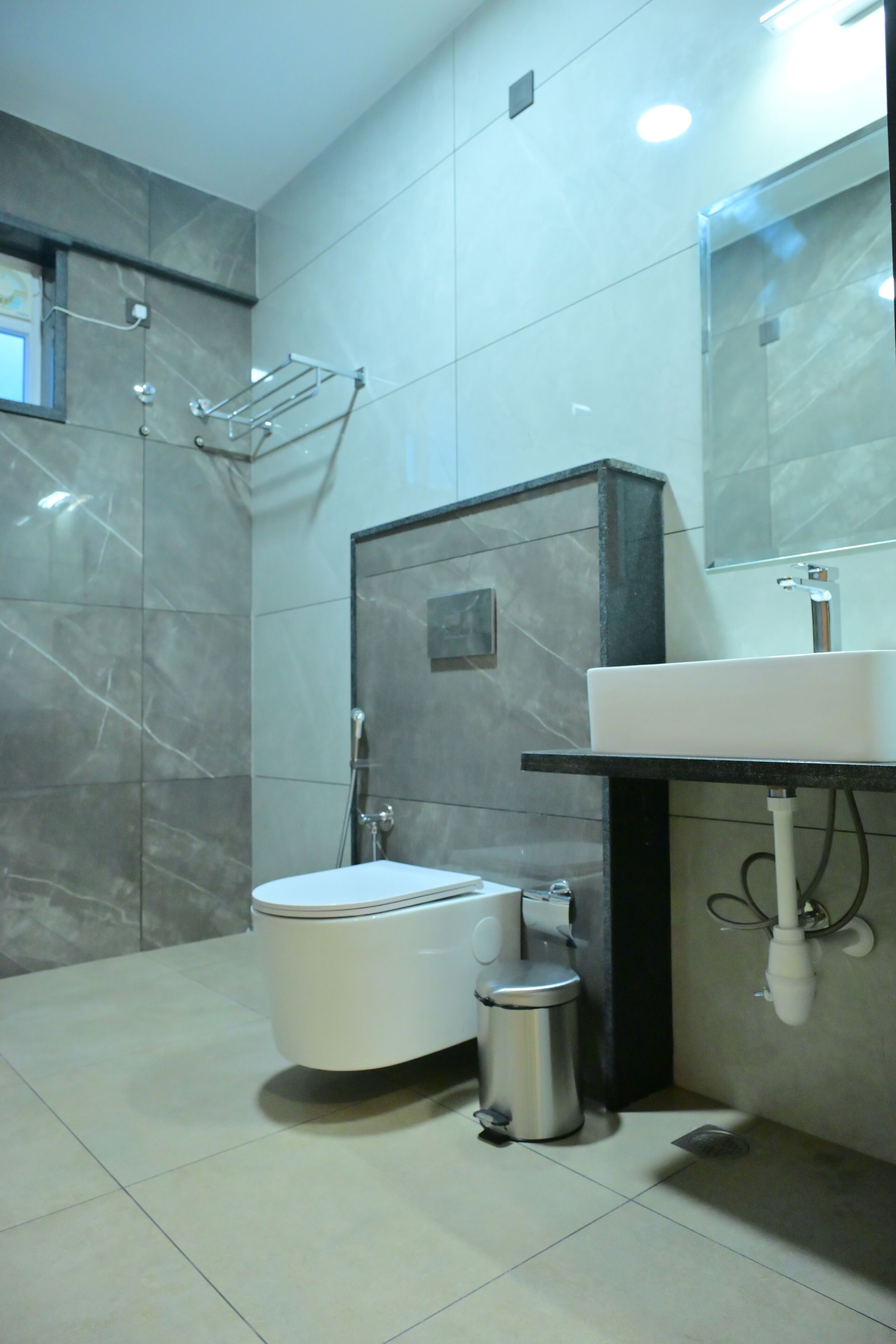 Shower, designer toiletries, hair dryer, towels