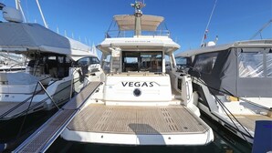 A marina with a boat named 'VEGAS' docked. - Sun-Kissed Sailing Adventure in Zadar, Croatia (Biograd na moru)