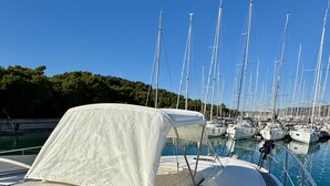 A marina with multiple sailboats docked. - Sun-Kissed Sailing Adventure in Sibenik, Croatia (Rogoznica)
