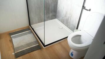Shower, hair dryer, shampoo