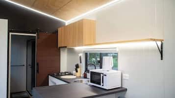 Fridge, electric kettle, cookware/dishes/utensils
