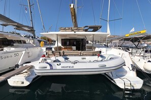 A marina with boats named 'Saba 50' and 'Highfield' docked. - Sun-kissed Sailing Adventure in Split-Dalmatia, Croatia (Trogir)