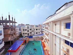 Deluxe Double Room, Pool View | View from room - Digha Hotel with Pool Park Prime (Digha)