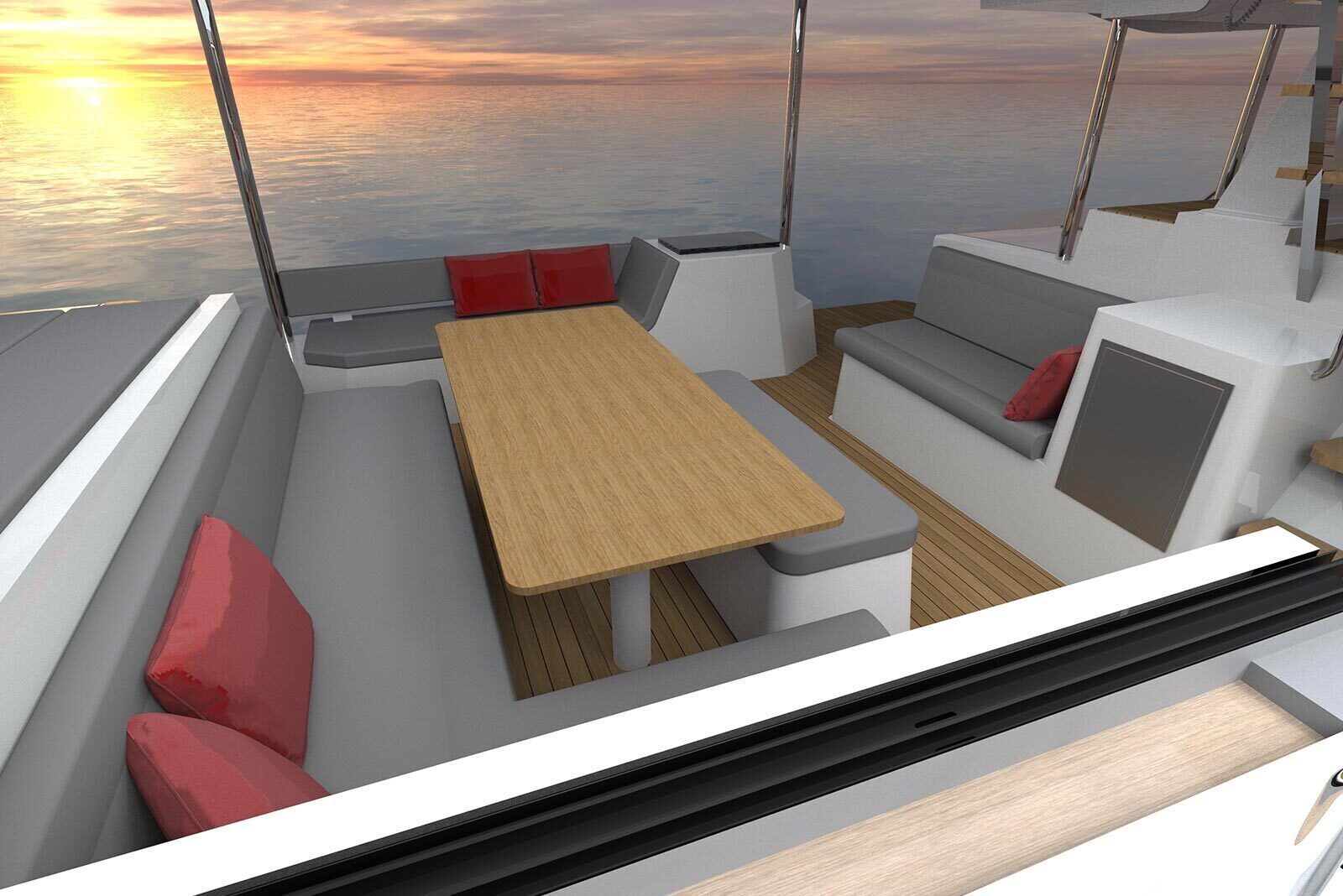 Interior de barco con mesa, asientos y vista al agua.