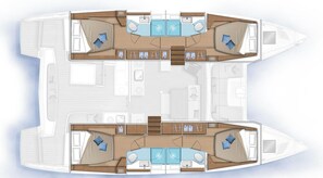 A boat interior with a dining area, two separate living areas with sofas and tables, and a small kitchen. - Sun-Kissed Sailing Adventure in the Ionian Islands, Lefkada (Lefkada)