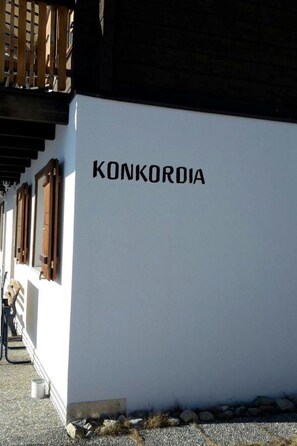 A building with the name 'KONKORDIA' on its facade. - Konkordia 2 EG Süd-Ost Appartement/Fewo, Dusche oder Bad, WC by Interhome (Bettmeralp)