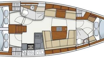 A boat interior with a kitchen area, seating, and a dining space.