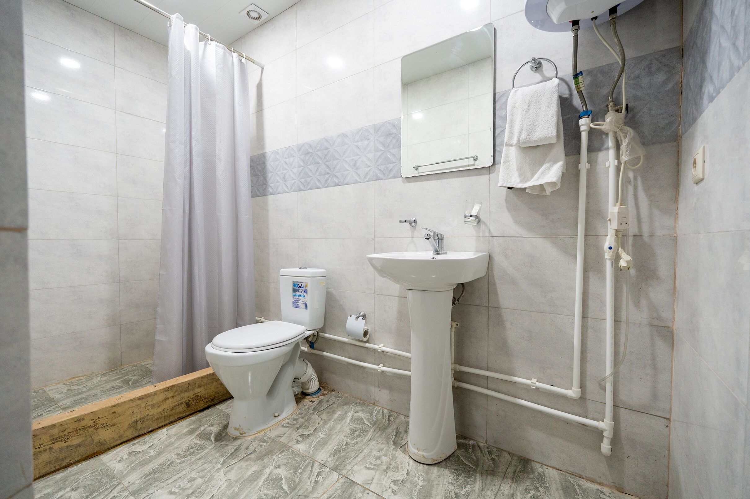 Hair dryer, towels, soap, toilet paper