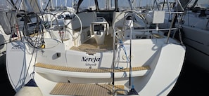 A yacht named 'Nereja' with a steering wheel, control panel, and a wooden deck. - Sun-Kissed Sailing Adventure in Zadar, Croatia (Biograd na moru)