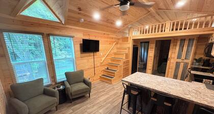 Escape to the beauty of the mountains in this cozy 2-bedroom tiny home.