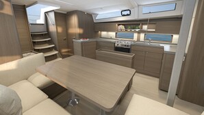 A compact kitchen with a dining area, built-in cabinets, and a small stove. - Sun-kissed Sailing Adventure in Split-Dalmatia, Croatia (Seget Donji)