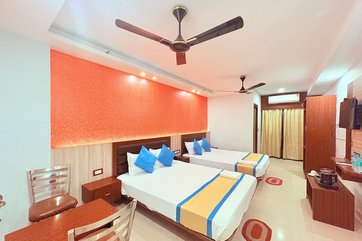 Premium Quadruple Room, City View | Desk, free WiFi