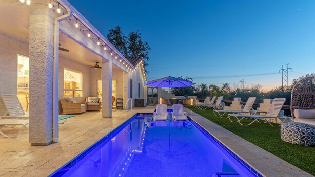 A swimming pool with lounge chairs, a covered patio area, and a view of the sky. - MT Views, Golf Oasis, Htd POOL, Spa, Smart TVs (Gold Canyon)