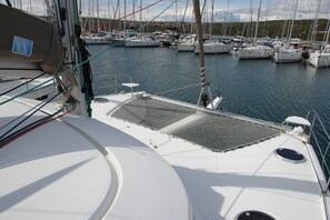 A marina with multiple sailboats docked. - Sun-Kissed Sailing Adventure in Northern Croatia (Punat)