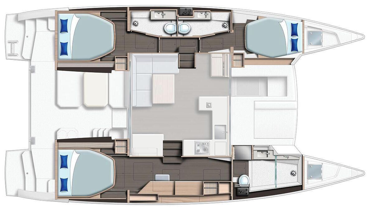 Interior de un barco con comedor, cocina y dos camarotes con camas.