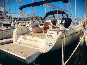 A marina with multiple sailboats docked, including one named 'Spectra Zadar.' - Sun-Kissed Sailing Adventure in Zadar, Croatia (Drage)
