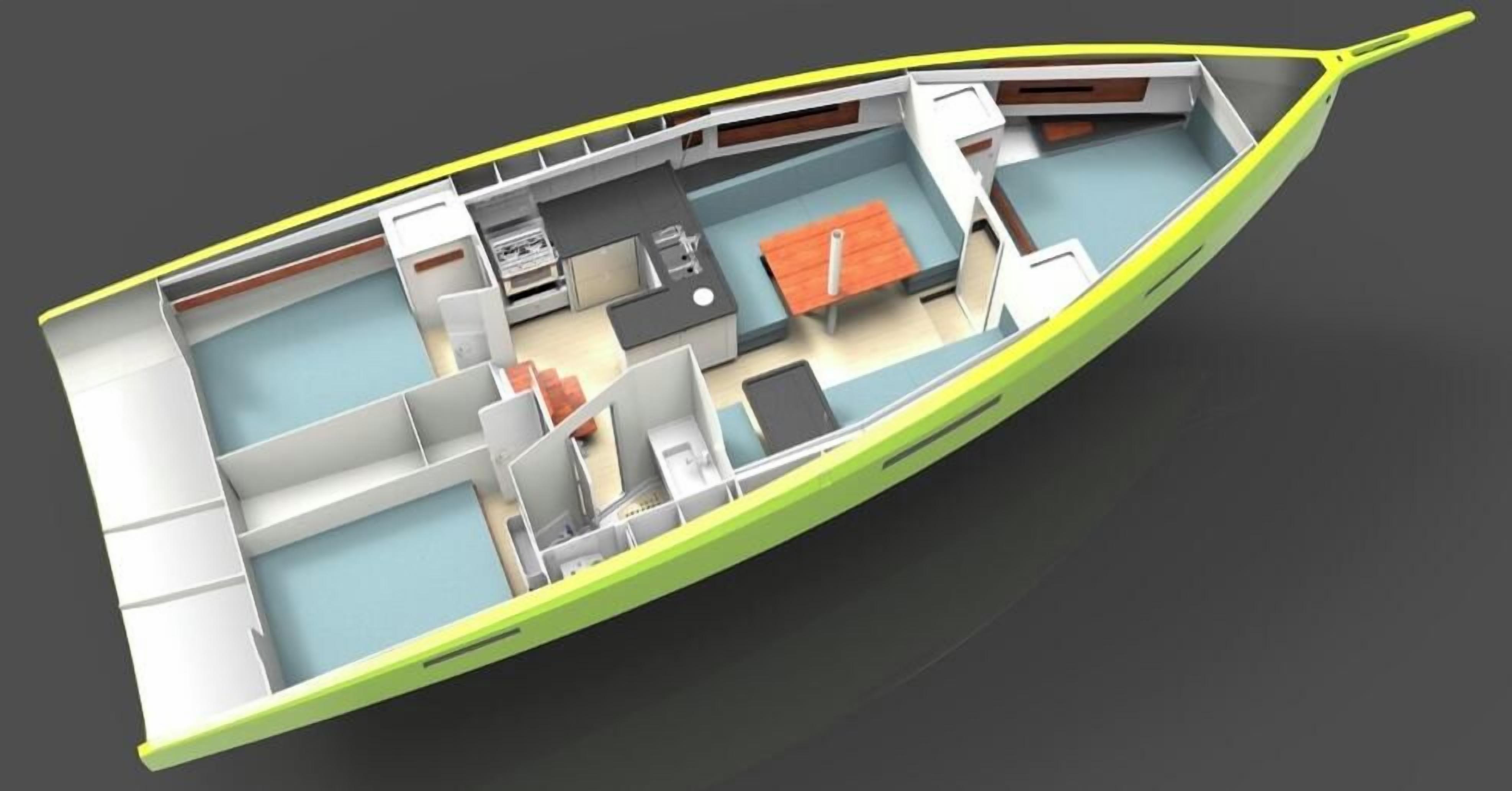 L'intérieur d'un bateau comprenant une cuisine, un coin repas et un espace salon.