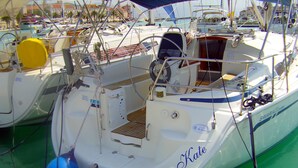 A boat docked at a marina with a name 'Kate' visible on the side. - Sun-kissed Sailing Adventure in Split-Dalmatia, Croatia (Trogir)
