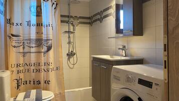 Hair dryer, towels, soap, toilet paper