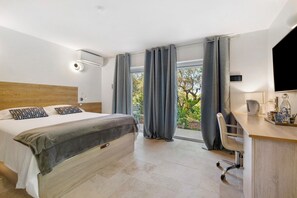 1 habitación, tabla de planchar con plancha, wifi y ropa de cama 