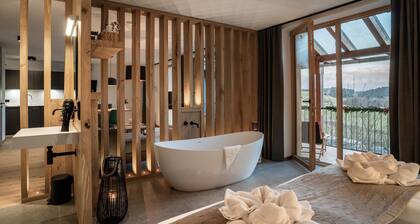 FORSTGUT - Chalets & Suiten