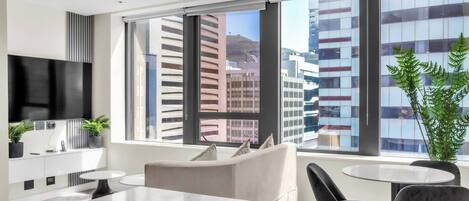 Appartement, 1 chambre, accessible aux personnes à mobilité réduite, vue sur la ville | Aire de séjour