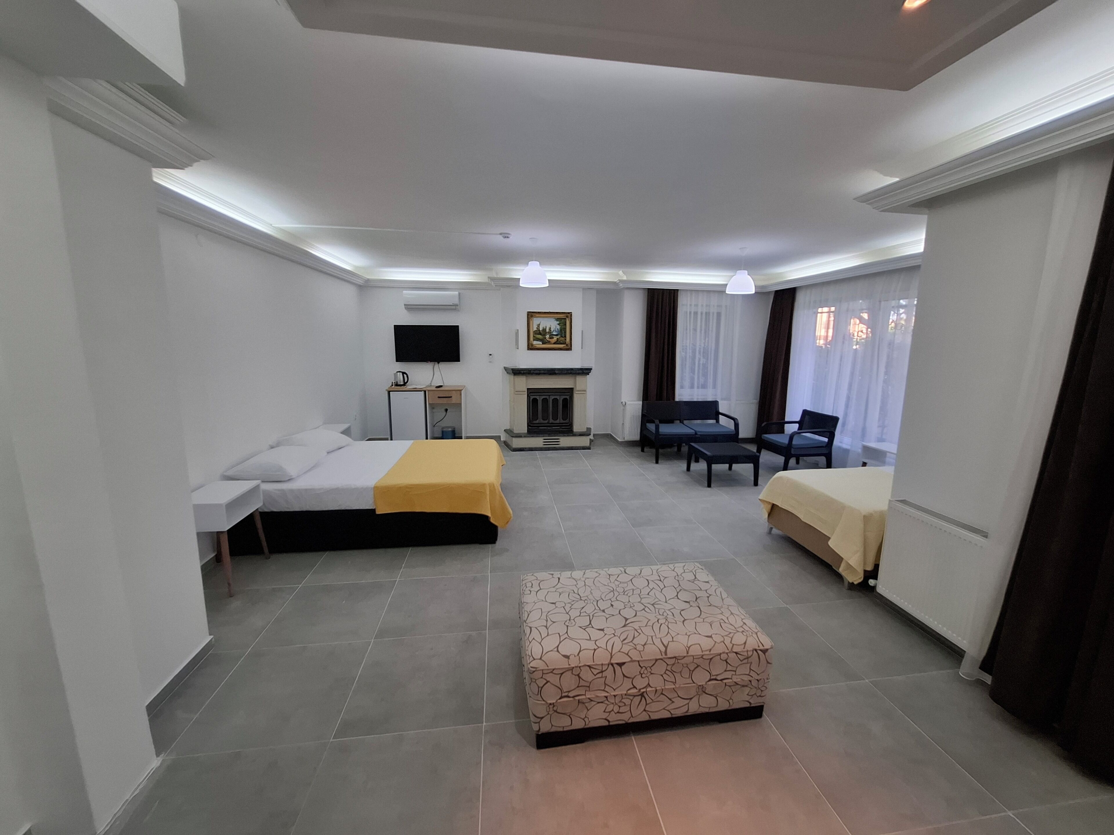 Deluxe-Vierbettzimmer, Balkon, Gartenblick
