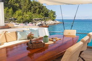 Outdoor dining - Sun-Kissed Sailing Adventure in Split, Croatia (Kaštel Gomilica)