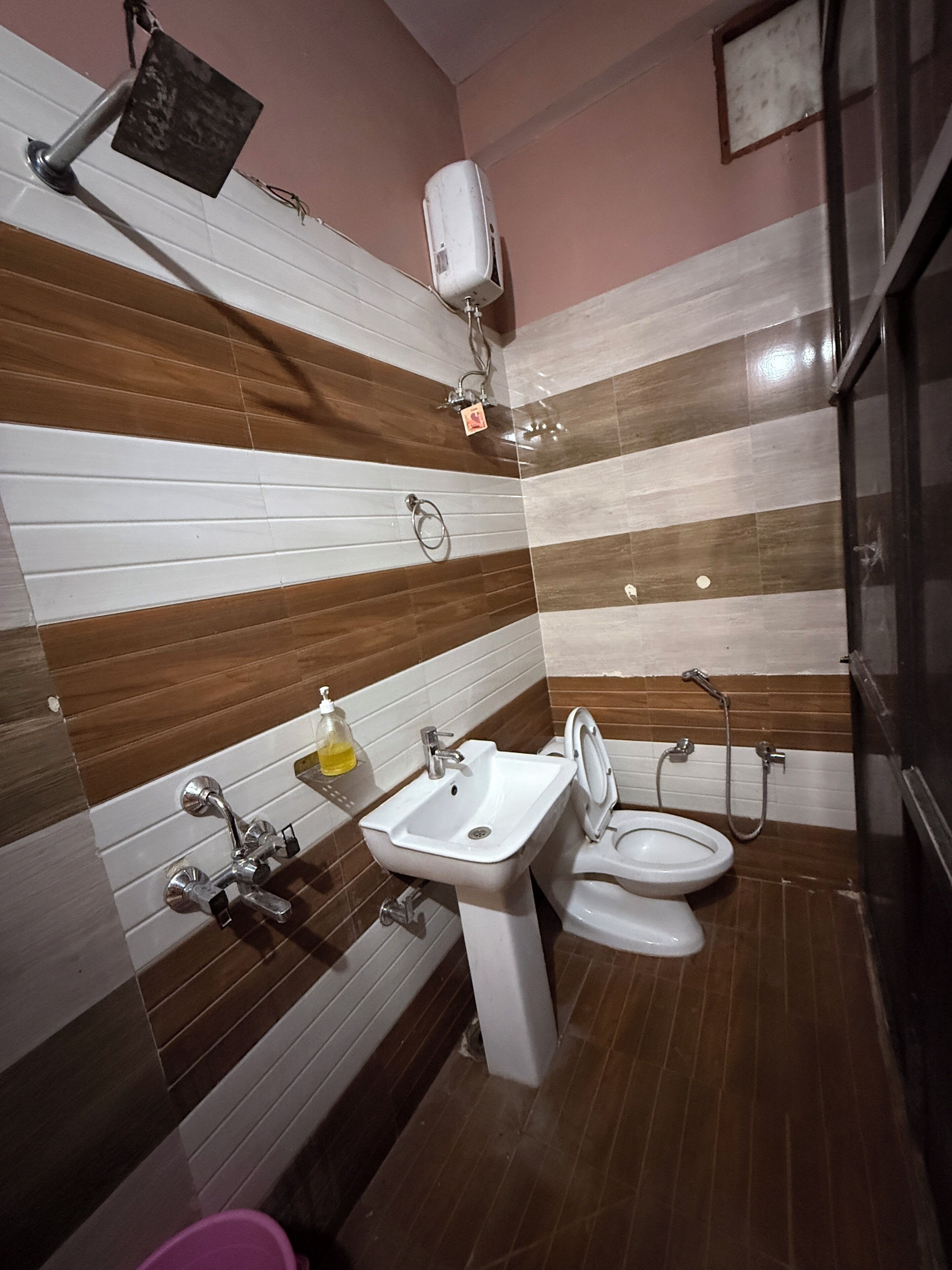 Shower, slippers, towels, soap