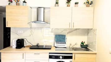 Fridge, microwave, cookware/dishes/utensils