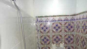 Double Room | Bathroom | Combined shower/tub, hair dryer, slippers, towels
