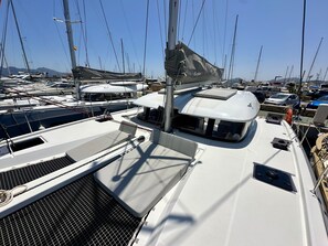 A marina with multiple sailboats docked. - Sun-Kissed Sailing Adventure in Islas Baleares, Mallorca (Port de Pollença)