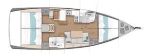 A boat interior with a dining area, kitchen, and seating arrangements.