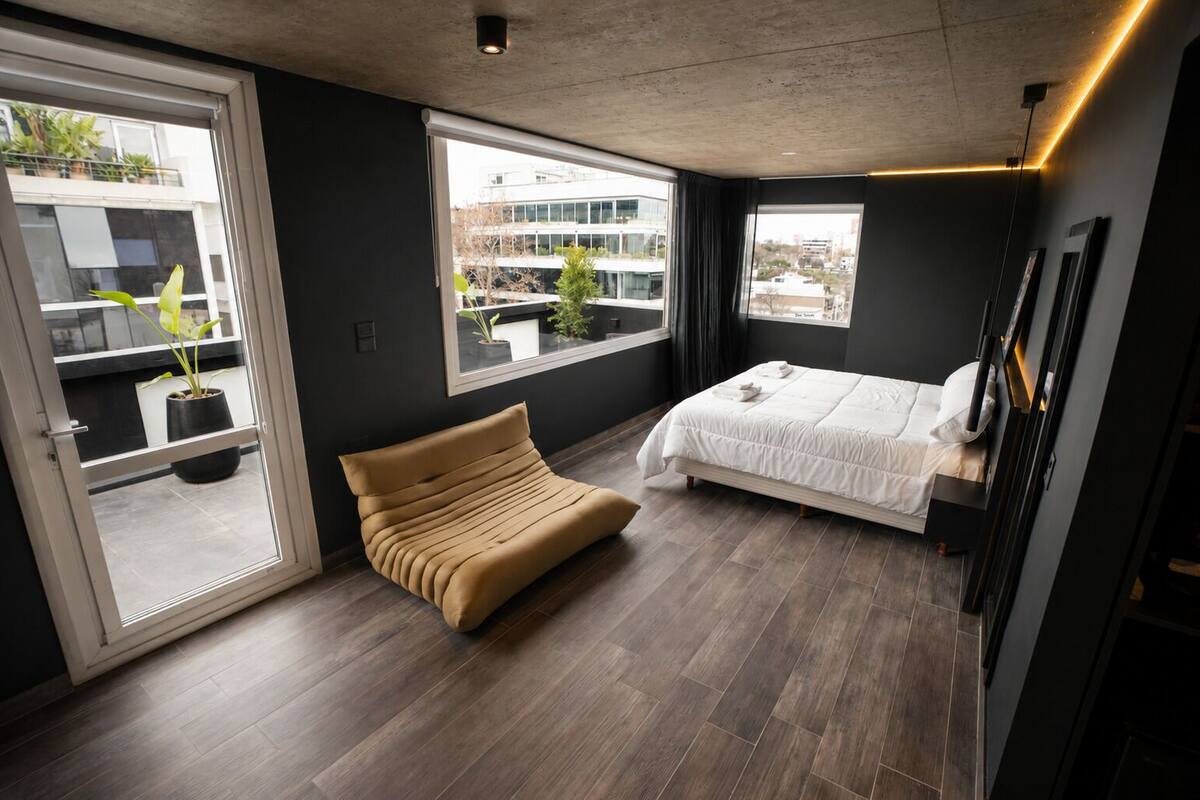 Deluxe Studio, Balcony, City View | Minibar, in-room safe, laptop workspace, blackout drapes