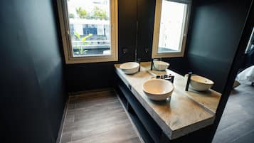 Deluxe Studio, Balcony, City View | Bathroom | Shower, hair dryer, towels, soap