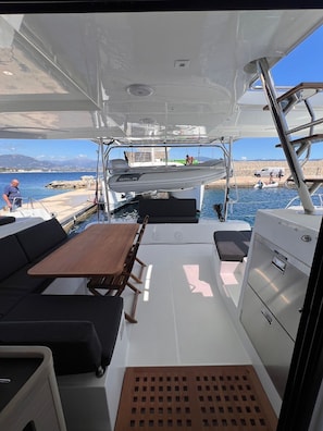 Outdoor dining - Sun-Kissed Sailing Adventure in Córcega (Cuchery)